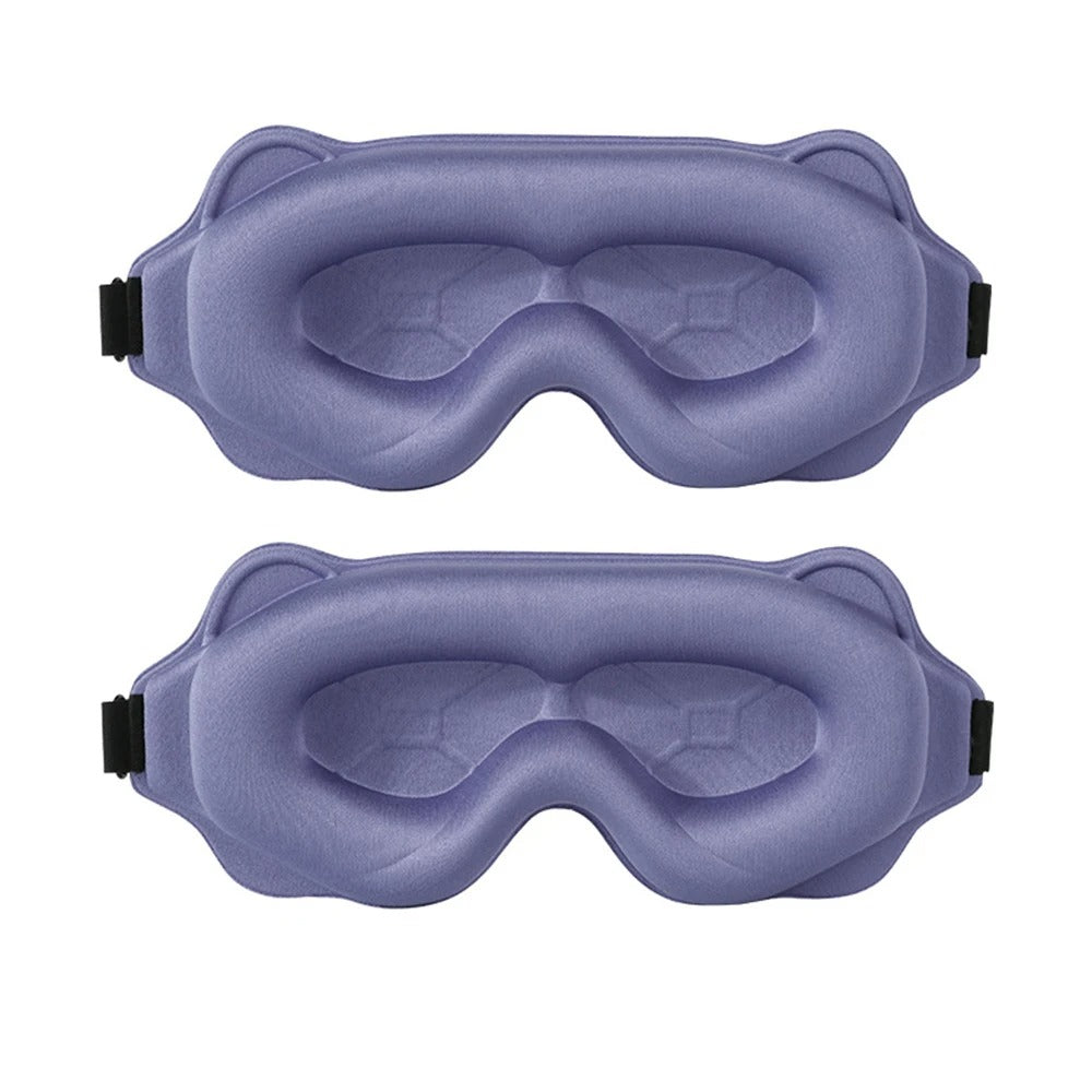 Two blue sleep masks on a white background