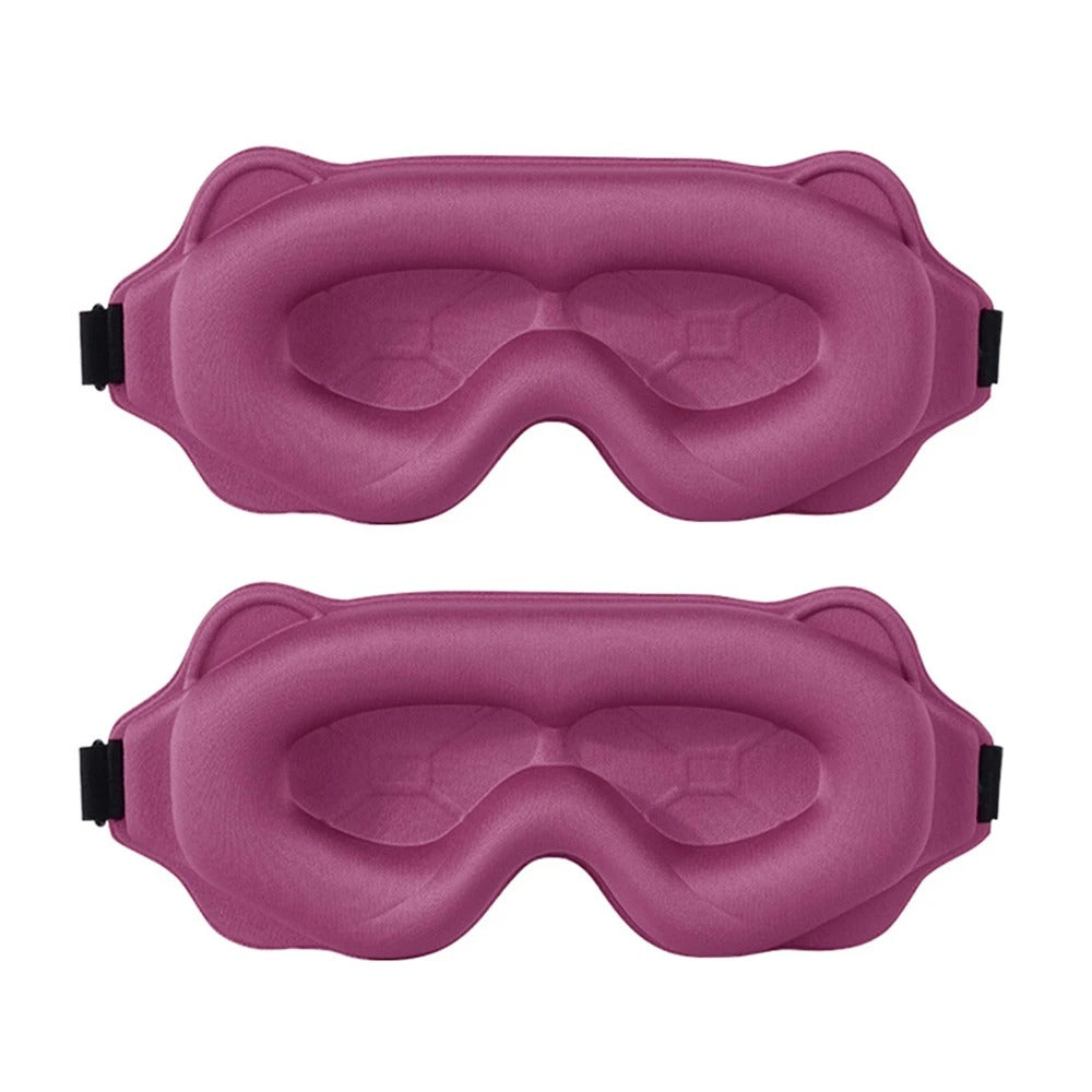 Two pink eye masks on a white background